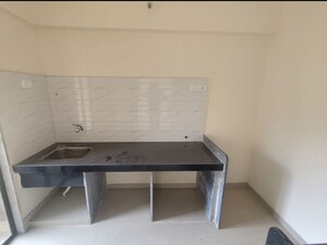 Kitchen in 2 BHK Apartment at Paradigm Zenith Pushpanjali Residency Phase III, Ghodbunder Road – for Rent
