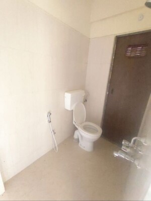Bathroom in 2 BHK Apartment at Paradigm Zenith Pushpanjali Residency Phase III, Ghodbunder Road – for Rent