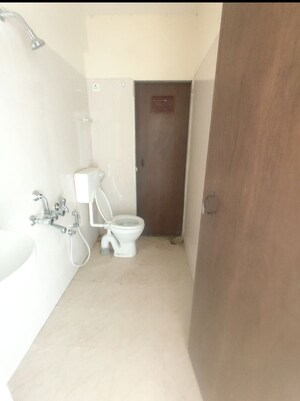 Bathroom in 2 BHK Apartment at Paradigm Zenith Pushpanjali Residency Phase III, Ghodbunder Road – for Rent