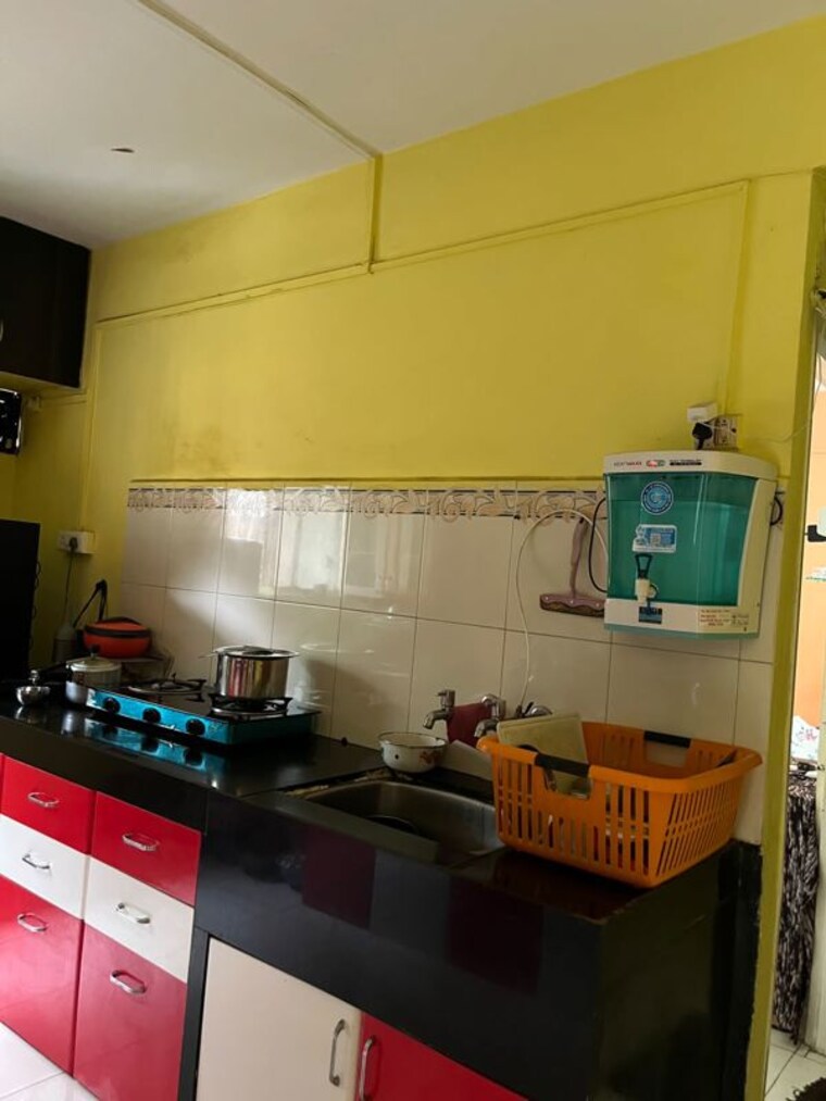 Kitchen, laxmi-nagar-society 2 Bedroom 850 Sq.Ft. Apartment In Dhanori Pune 10590474