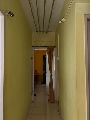 Building Lobby in 2 BHK Apartment at Laxmi Nagar Society, Dhanori – for Rent
