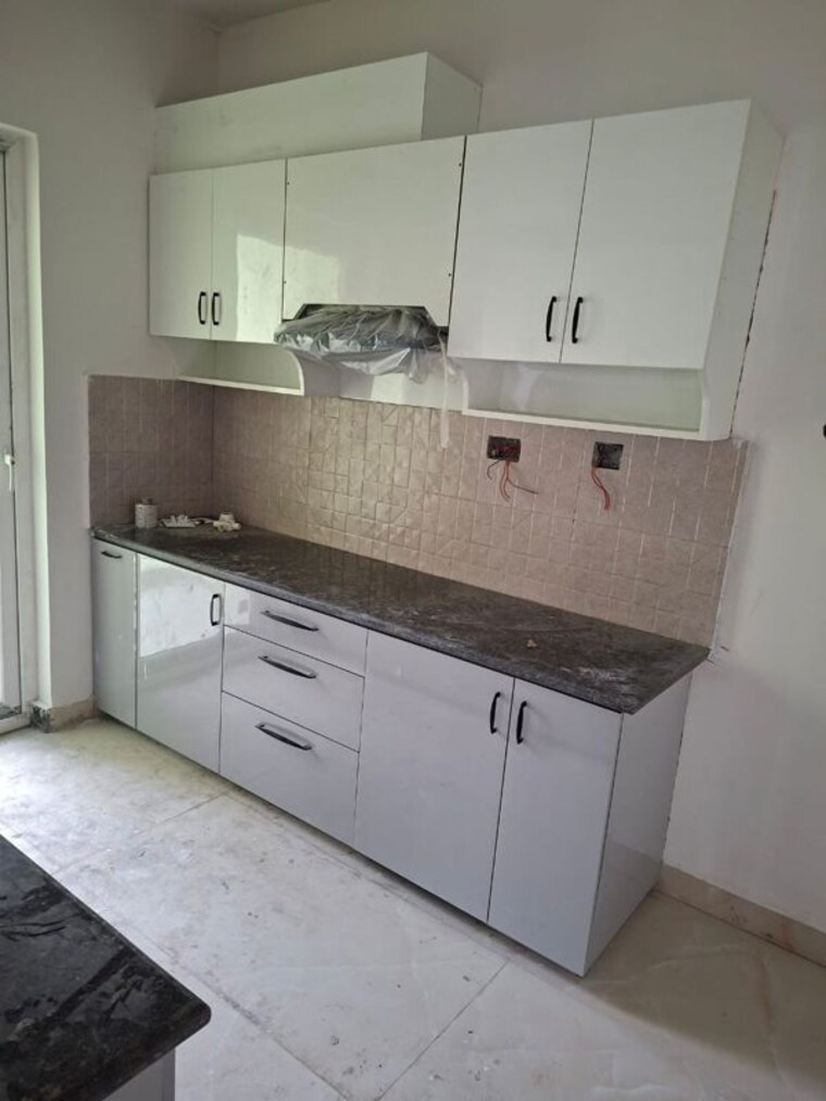 Kitchen, ansal-celebrity-meadows 2 Bedroom 1300 Sq.Ft. Apartment In Sushant Golf City Lucknow 10590562