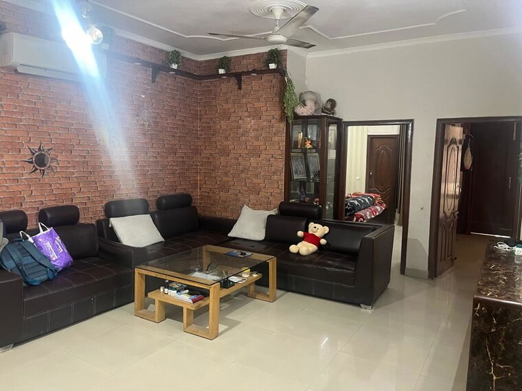 Living Room, aura-homes 3 Bedroom 1860 Sq.Ft. Apartment In Patiala Road Zirakpur 10590606