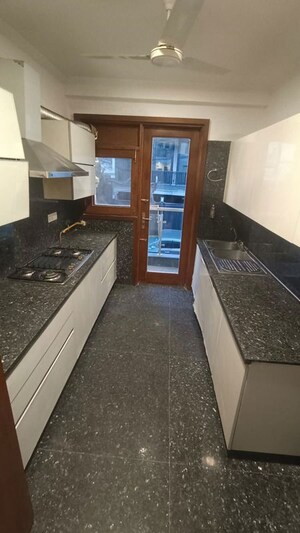 Kitchen in 3 BHK Builder Floor at Greater Kailash I – for Sale