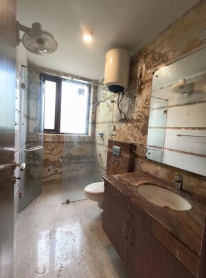 Bathroom in 3 BHK Builder Floor at Panchsheel Enclave – for Rent