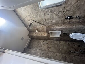 Bathroom in 4 BHK Builder Floor at Dwarka Mor – for Rent
