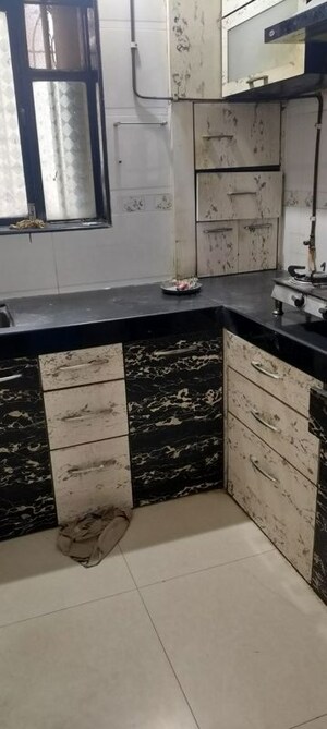 Kitchen in 1 BHK Apartment at Priyadarshini Chs Seawoods, Seawoods – for Sale