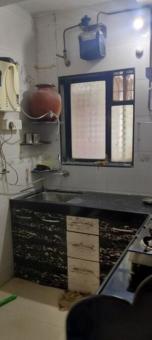 Kitchen in 1 BHK Apartment at Priyadarshini Chs Seawoods, Seawoods – for Sale