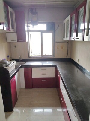 Kitchen in 1.5 BHK Apartment at Lodha Casa Royale, Balkum Pada – for Sale