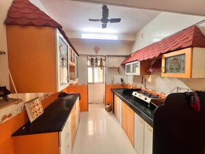 Kitchen in 2 BHK Apartment at Raj Infinia, Malad West – for Sale