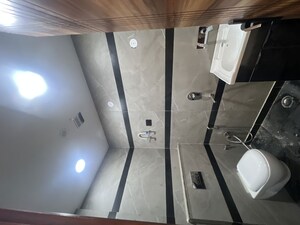 Bathroom in 4 BHK Builder Floor at Dwarka Mor – for Rent