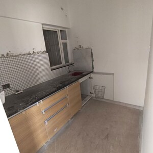 Kitchen in 2 BHK Apartment at Omkar Signet, Malad East – for Rent