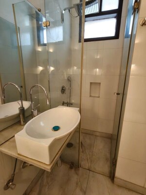 Bathroom in 3 BHK Builder Floor at Defence Colony – for Rent