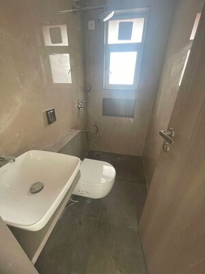 Bathroom in 2 BHK Apartment at Pratham 5TH Element, Andheri West – for Rent