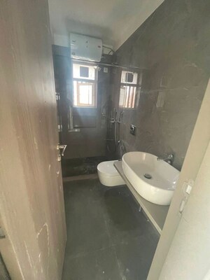 Bathroom in 2 BHK Apartment at Pratham 5TH Element, Andheri West – for Rent