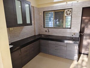 Kitchen in 2 BHK Apartment at Suyog Nikunj, Baner – for Rent