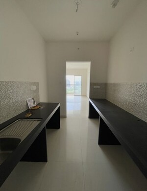Kitchen in 2 BHK Apartment at Godrej Nurture Pune, Mamurdi – for Rent