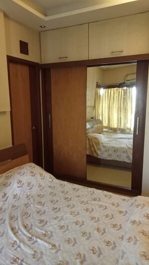 Bedroom in 3 BHK Apartment at Raheja Tipco Heights, Malad East – for Rent