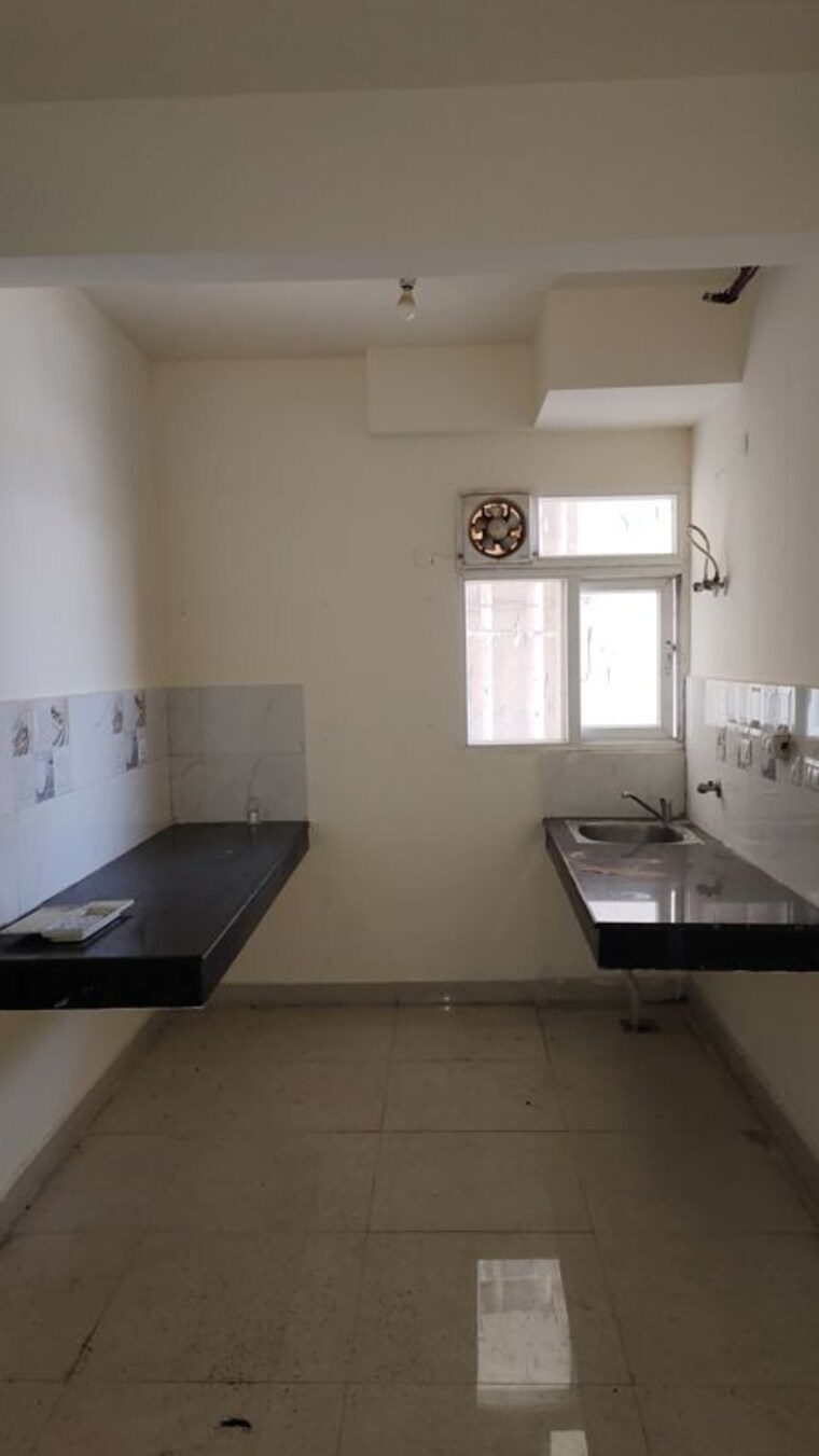 Kitchen, signature-global-the-roselia 2 Bedroom 569 Sq.Ft. Apartment In Sector 95a Gurgaon 10591219
