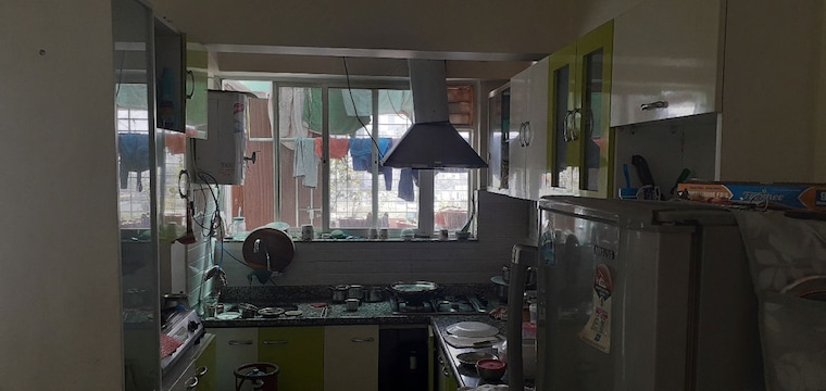 Kitchen, gera-planet-of-joy 2 Bedroom 1100 Sq.Ft. Apartment In Kharadi Pune 10591221
