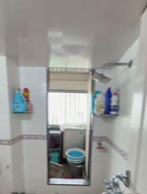 Bathroom in 2 BHK Apartment at Eden Woods complex, Manpada – for Sale