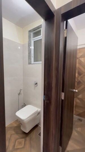Bathroom in 1 BHK Apartment at Shree Tirupati STG Signature Residency, Patlipada – for Rent