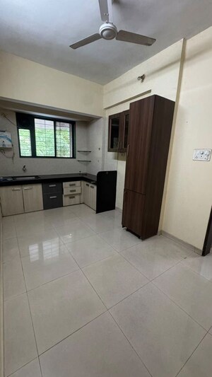 Kitchen in 2 BHK Apartment at Ranade Yashodhan, Mayur Colony – for Rent