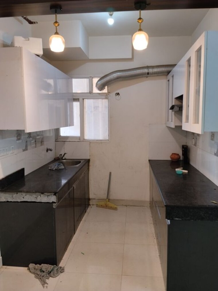 Kitchen, signature-global-the-roselia 2 Bedroom 514 Sq.Ft. Apartment In Sector 95a Gurgaon 10591269