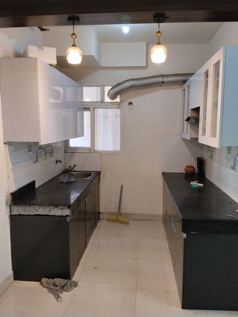 Kitchen, signature-global-the-roselia 2 Bedroom 514 Sq.Ft. Apartment In Sector 95a Gurgaon 10591269