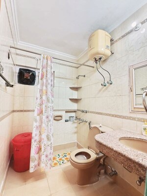 Bathroom in 2 BHK Builder Floor at Vasant Kunj – for Rent