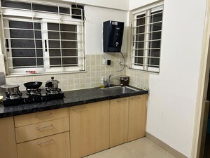 Kitchen in 3.5 BHK Apartment at Mantra Sky Homes, Magarpatta City – for Sale