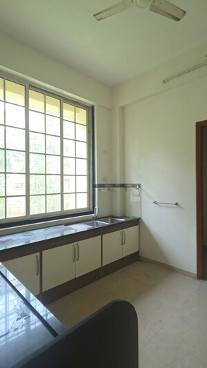 Kitchen in 5 BHK Villa at Bhimjyani Verraton, Manpada – for Sale