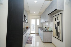 Kitchen in 2 BHK Apartment at Gulshan Botnia, Sector 144 – for Sale