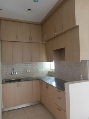 Kitchen in 2 BHK Apartment at Amrapali Dream Valley – for Rent