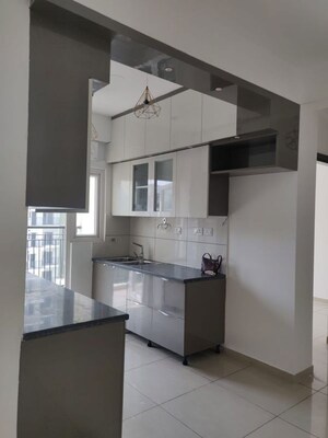 Kitchen in 2 BHK Apartment at Radhey Krishna Casa Green I, Sector 16 Greater Noida – for Sale
