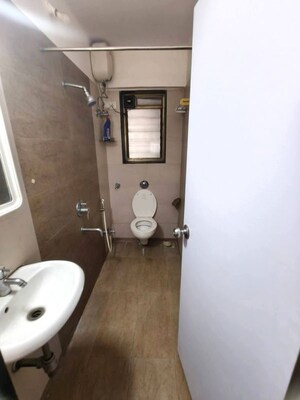Bathroom in 2 BHK Apartment at Basera CHS, Andheri West – for Rent
