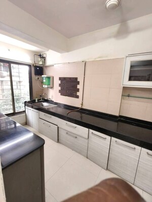 Kitchen in 2 BHK Apartment at Basera CHS, Andheri West – for Rent