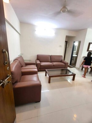 Living Room in 2 BHK Apartment at Basera CHS, Andheri West – for Rent