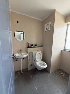 Bathroom in Studio Apartment at Sarvottam NX One, Tech Zone 4 Greater Noida – for Rent
