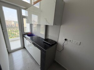 Kitchen in Studio Apartment at Sarvottam NX One, Tech Zone 4 Greater Noida – for Rent
