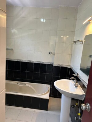 Bathroom in 3 BHK Apartment at Richmond Premier, Richmond Road – for Rent