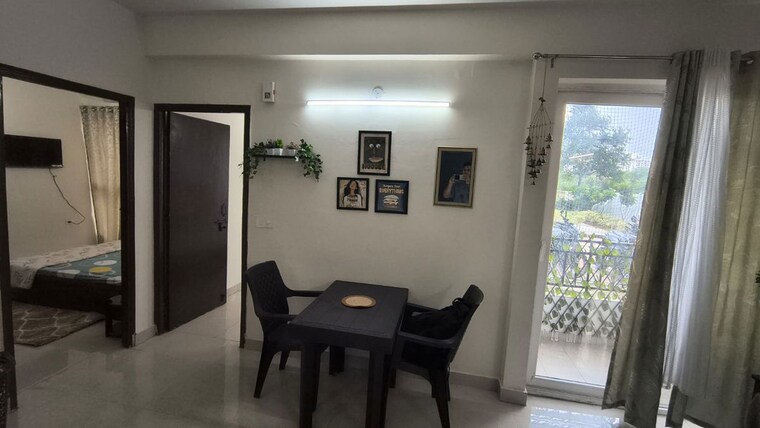 Dining area, signature-global-proxima-phase-2 2 Bedroom 850 Sq.Ft. Apartment In Sector 89 Gurgaon 10591374