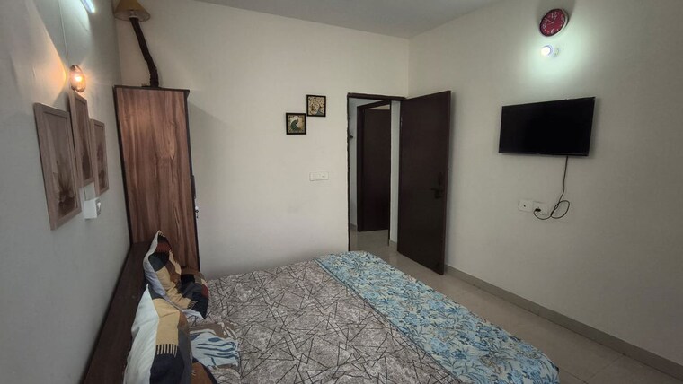 Bedroom, signature-global-proxima-phase-2 2 Bedroom 850 Sq.Ft. Apartment In Sector 89 Gurgaon 10591374