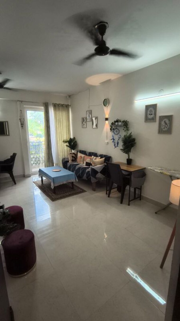 Living Room, signature-global-proxima-phase-2 2 Bedroom 850 Sq.Ft. Apartment In Sector 89 Gurgaon 10591374