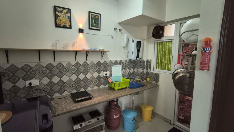 Kitchen, signature-global-proxima-phase-2 2 Bedroom 850 Sq.Ft. Apartment In Sector 89 Gurgaon 10591374