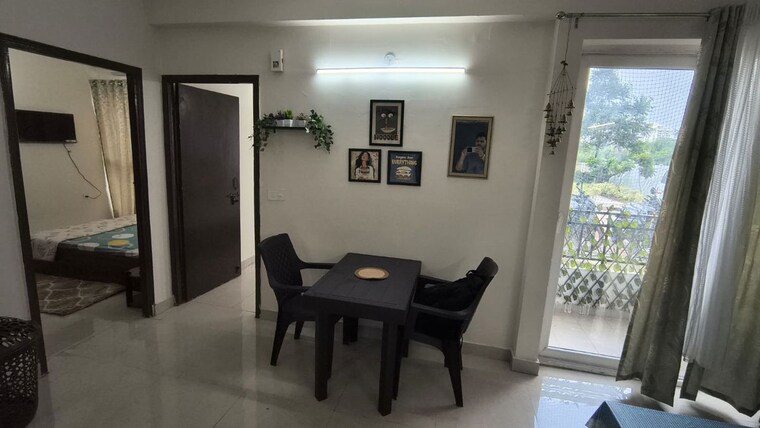 Dining area, signature-global-proxima-phase-2 2 Bedroom 850 Sq.Ft. Apartment In Sector 89 Gurgaon 10591374