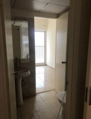 Bathroom in 3 BHK Apartment at Gaur Atulyam, Omicron I Greater Noida – for Rent