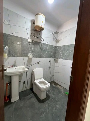Bathroom in 1 BHK Builder Floor at Chattarpur – for Rent