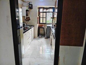Kitchen in 4 BHK Apartment at Arshie Complex, Versova – for Sale