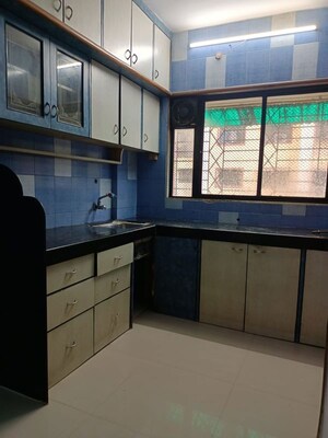 Kitchen in 1 BHK Apartment at Metropolis Bayside, Kasarvadavali – for Rent